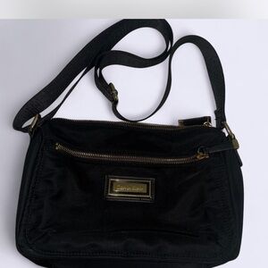 Calvin Klein Black Crossbody Bag with Gold Accents